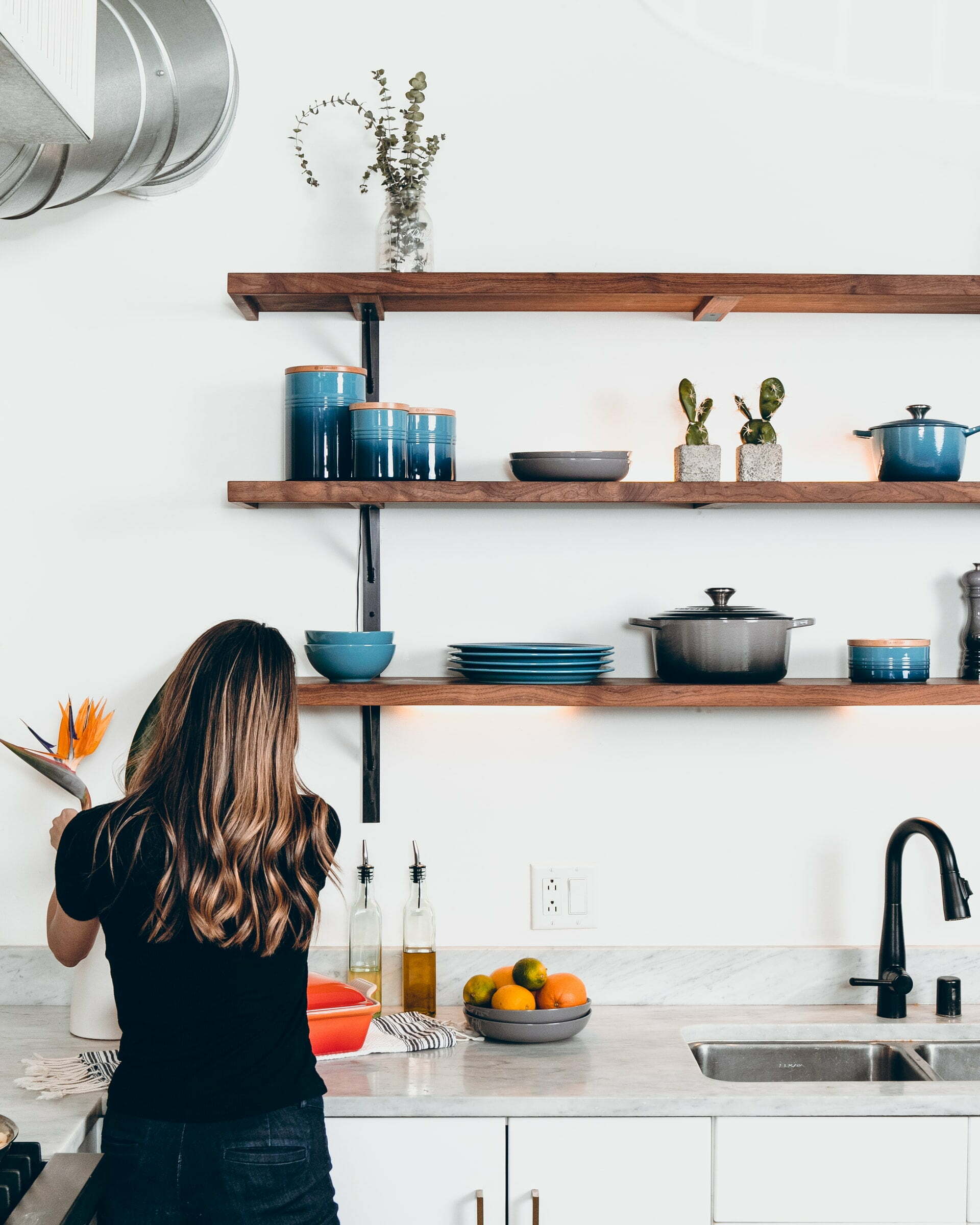 a woman in a kitchen