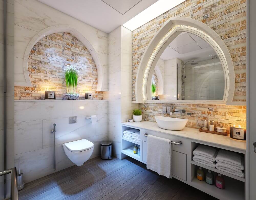 a bathroom with a large stone arch