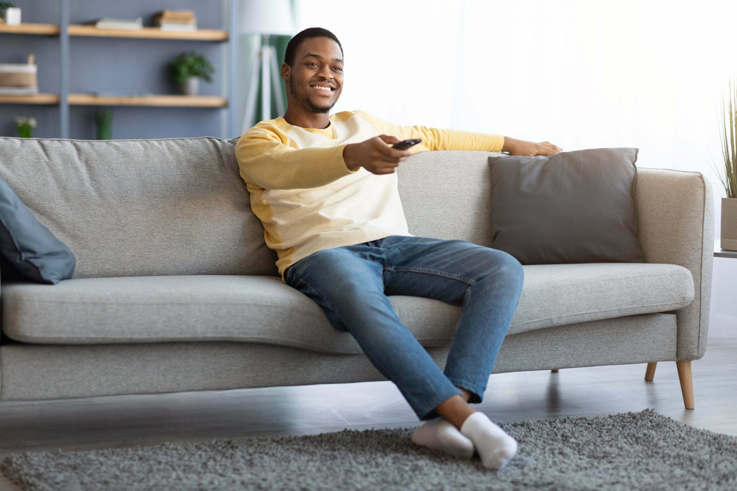 a person sitting on a couch