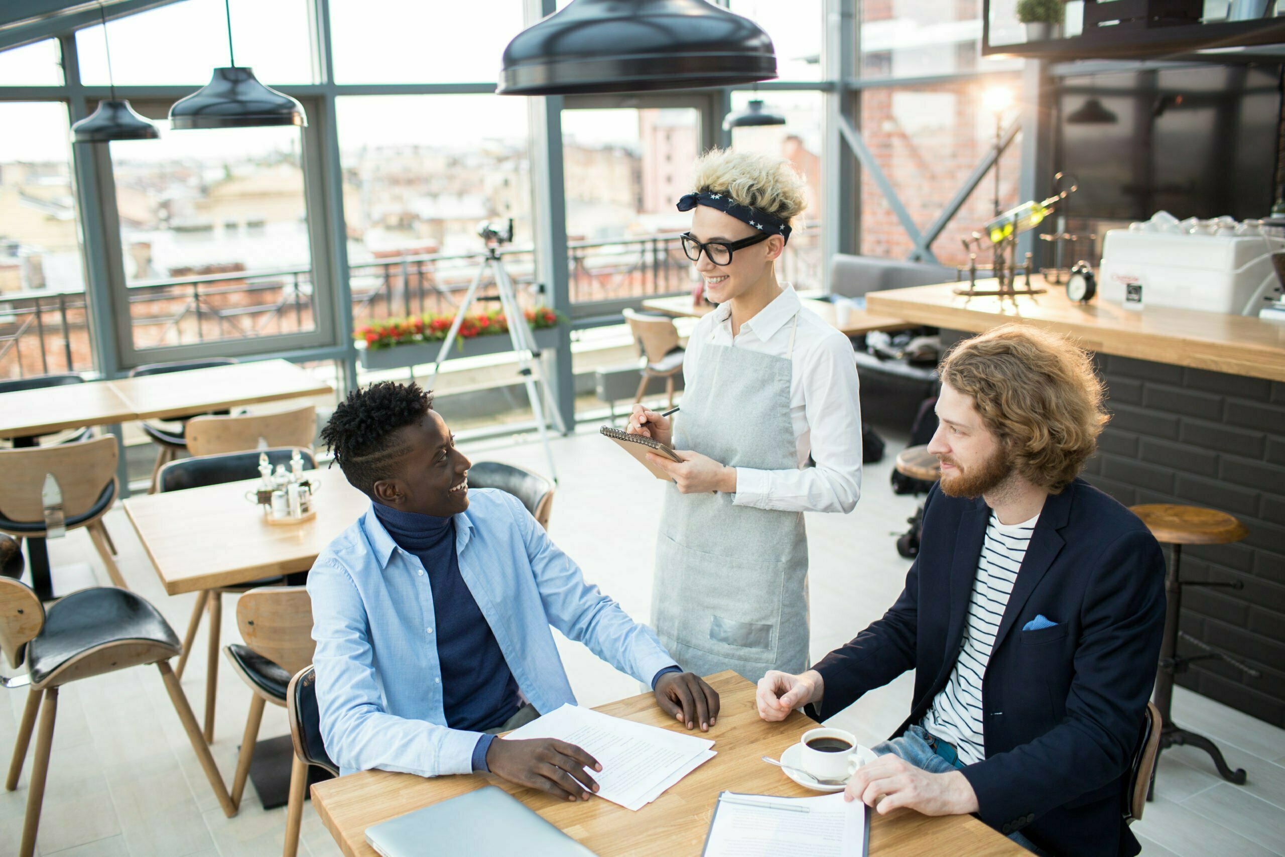 a group of people sitting at a table